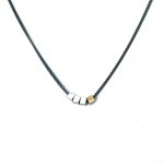 Collaret cub d'or i tres cubs plata