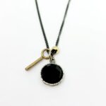 Collaret cristall i bola d'or groc