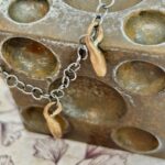 Collaret plata tres penjolls bronze