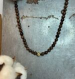 Collaret boles banús i central d'or groc