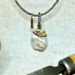 Collaret hematites perla australiana barroca