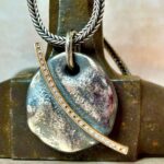 Collaret penjoll de plata, or rosa i diamants