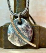 Collaret penjoll de plata, or rosa i diamants